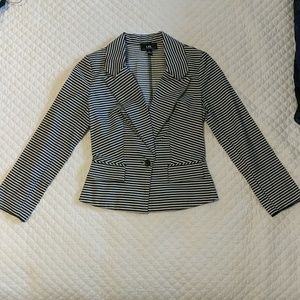 Navy and white striped blazer.